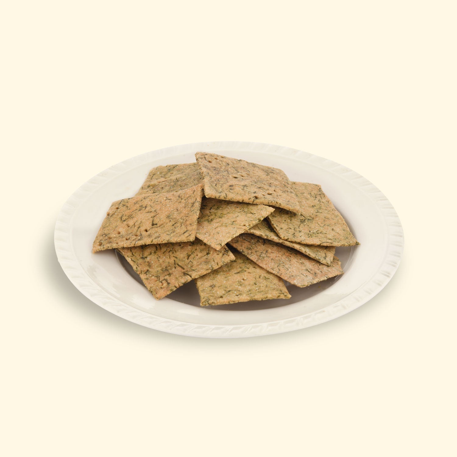 Crunchy dill crackers arranged in a rustic wooden bowl, highlighting a healthy and delicious snack choice.