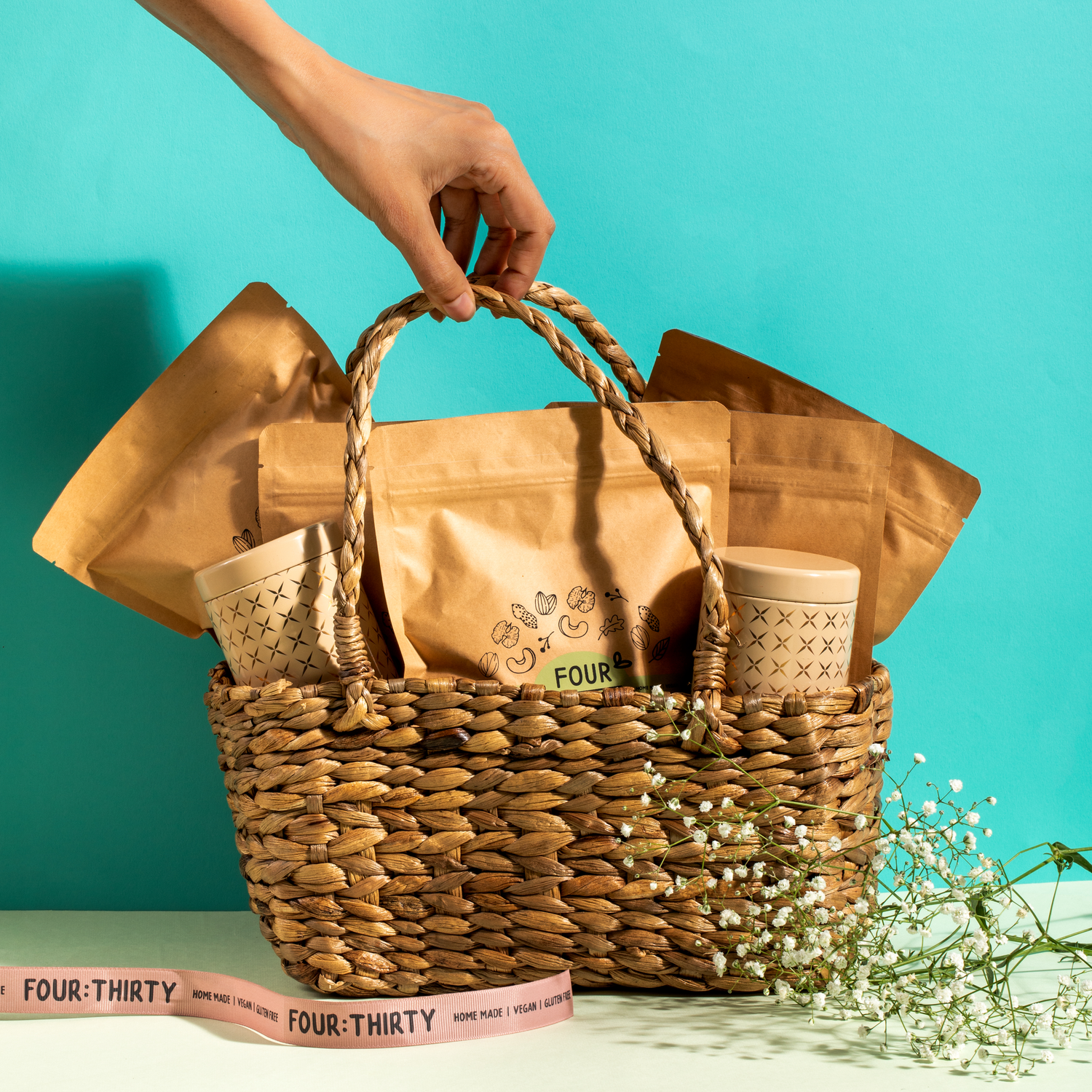 Image showcasing basket full of four thirty snacks