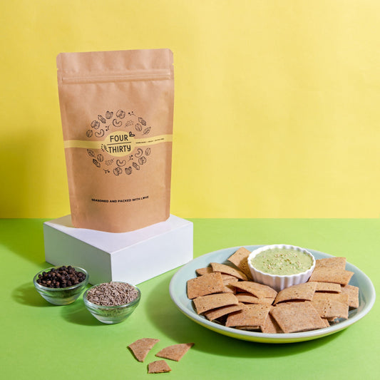 Package of crunchy cumin crackers, neatly arranged to showcase the healthy snack option.